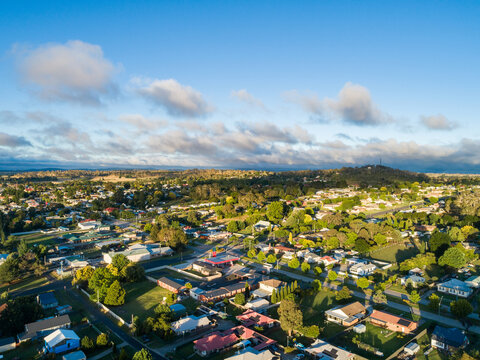 Country town neighbourhood with view over building and homes dotted with trees