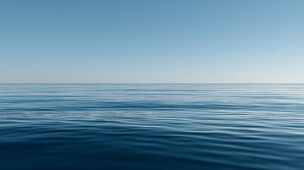 Obraz premium Tranquil Ocean Horizon Under a Clear Sky with Minimalist Water Reflection and Calm Atmosphere