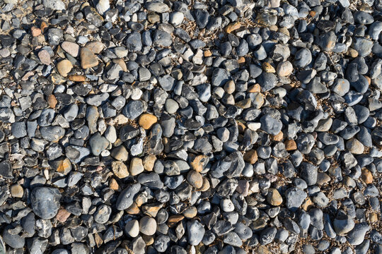 Kieselsteine am Strand, Hintergrundbild