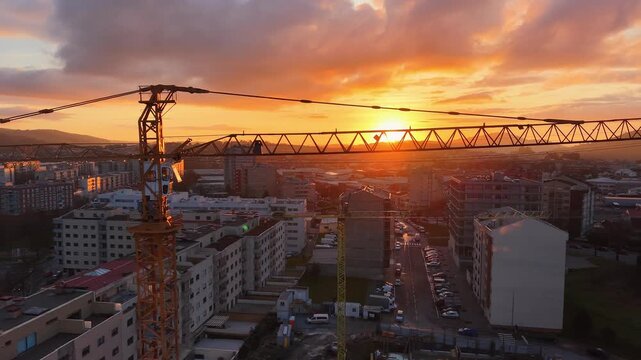 Construction crane at sunset in Braga, Portugal