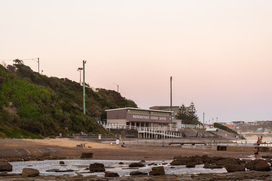 Merewether Ocean Baths building on coast at dusk