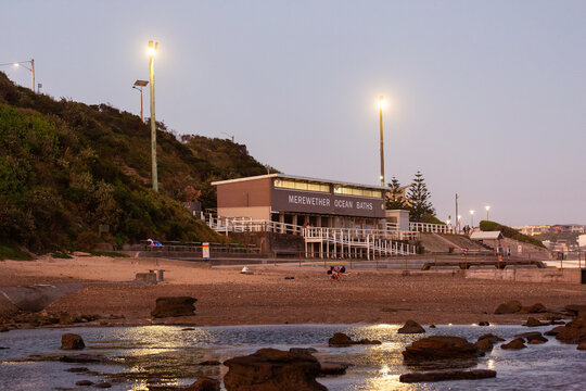 Merewether Ocean Baths building on coast at dusk