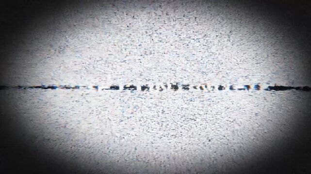 Static graphic. TO BE CONTINUED text with digital glitch loading effect. Analog CRT scanlines and screen noise. Broadcast ending element.