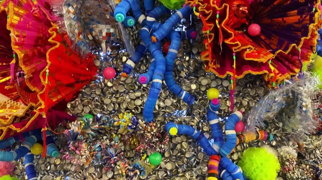 Colorful sculpture made entirely from recycled plastic waste, environmental art concept of material reuse.