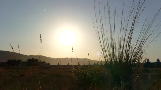 Ancient Mongolian monastery at sunset. Monastery Of Erdene Zuu. Kharkhorin, Mongolia. Sunny summer evening.