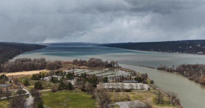 Ithaca, NY, USA - March 28, 2026 - Timelapse video of clouds moving in over the south end of Cayuga Lake on a cold spring day. 