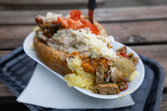 Kumpir Massive Turkish Loaded Baked Potato with Cheese Meat and Vegetables