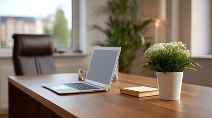 Fototapeta premium Serene modern office workspace with a wooden desk open laptop executive chair and decorative plant in natural light