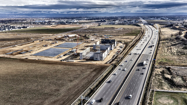 Aerial View of Highway Corridor with New Industrial and Commercial Buildings Under Development