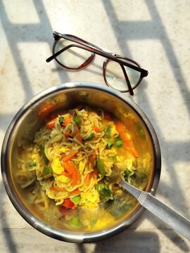 Breakfast with Homemade Noodles and vegetable soup, Morning sunlight and shadow. Freah and Hot served ready to eat.