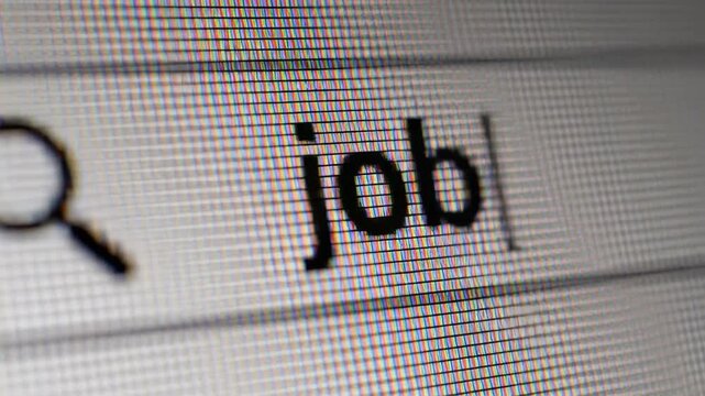 Macro View of Digital Search Bar showing a blinking cursor and magnifying glass icon on a pixelated screen ideal for technology and internet marketing concepts.