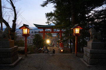 Red Torii gate of Chureito temple at sunset in Fujiyoshida. Landmark of Japan.