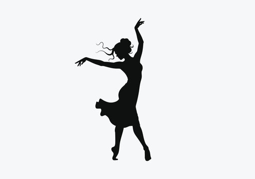 Silhouette of a woman dancing in a flowing dress