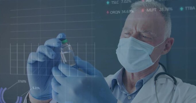 Raising vial to eye level, senior doctor inspecting, rotating, analyzing via data overlays