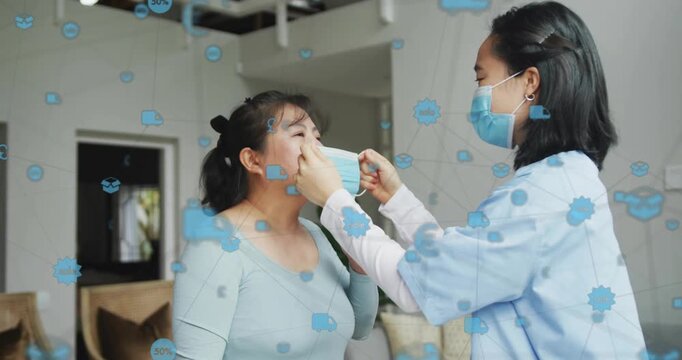 Caregiver fitting mask on patient, raising and adjusting nose bridge for health with blue icons