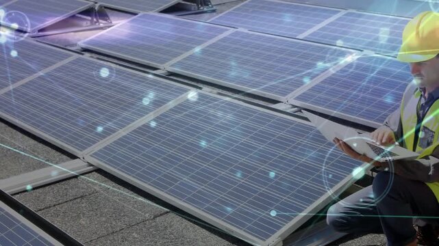 Male tech entering frame, kneeling by roof solar panels, monitoring diagnostics via laptop overlay