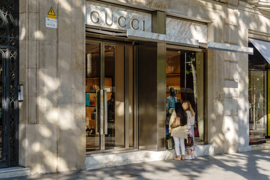Barcelona, Spain - May 11, 2021. Logo and facade of Gucci, an Italian luxury goods firm based in Florence, Italy