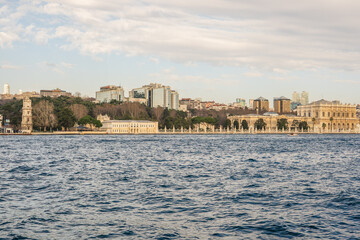 Fototapeta premium Dolmabahce Palace and Istanbul skyline across Bosphorus