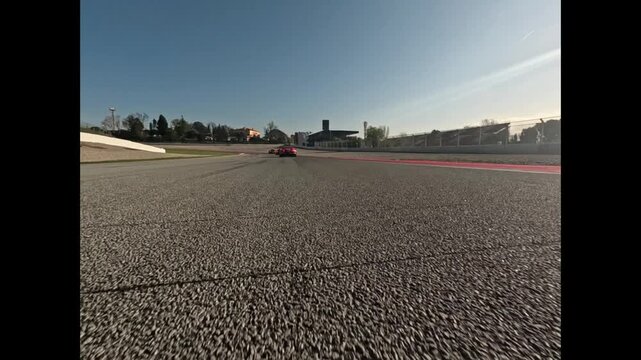 High-Speed POV Drive on a Racing Track &ndash; Fast Asphalt Motion and Intense Speed Sensation