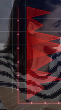 Vertical video: office woman turning listening as HUD overlaying face showing red flags and pink L