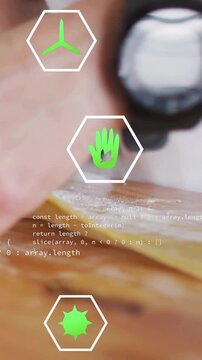 Vertical video: Chef hovering, pressing and prepping pasta on floury board, hex icons, code overlay