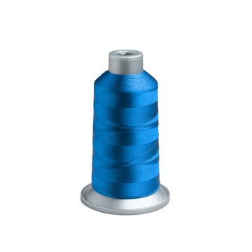 Industrial blue sewing thread spool for professional textile fashion.