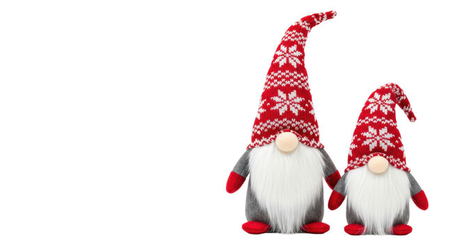 two plush scandinavian christmas gnomes (nisse/tomte) side-by-side, long white beards and red knitted snowflake hats, macro studio product shot on white with copy space, concept for festive holiday