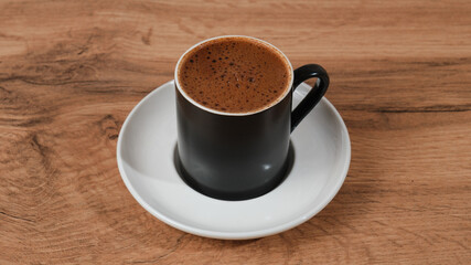 Fototapeta premium Hot chocolate black cup isolated