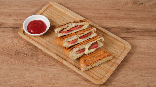 Turkish toast (tost) on wooden tray