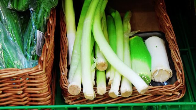 Fresh leeks on display at a local market during the afternoon hours