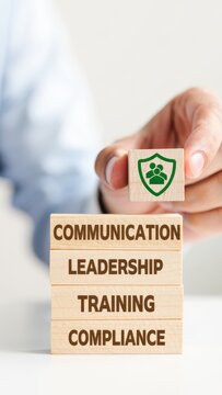 Compliance leadership communication training, corporate governance compliance management, workplace ethics awareness, business risk control, hand placing shield people icon block, wooden blocks stack