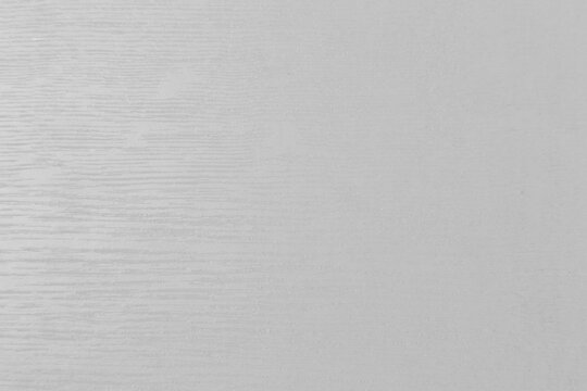 Smooth and subtle white wood texture with fine grain enhancing visual appeal and versatility