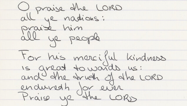Handwritten text on lined notepaper contains the Psalm 117 from the Book of Psalms in the OldTestament, written in English.
