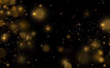 Fototapeta premium Falling gold dust sparkles create a magical luminous effect. Tiny particles drift softly across the scene. Perfect overlay for festive and New Year projects.
