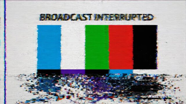 This shows a broadcast interrupted screen with a colorful graphic and text on a white background, indicating technical difficulties or an error in transmission.