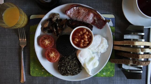 Full Scottish breakfast with haggis, black pudding and poached egg