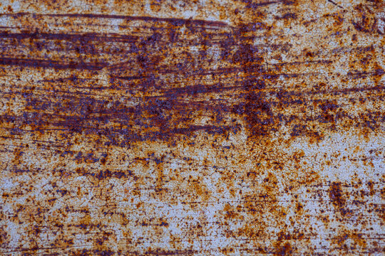 Rusted corroded oxidized metal surface texture with flaking deterioration