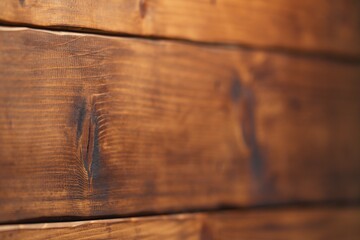 Macro photography of contrast grunge wooden wall with selective focus on weathered natural knotted wood part and wavy lines. Right side is softly blurred. Rustic backdrop with copy space.