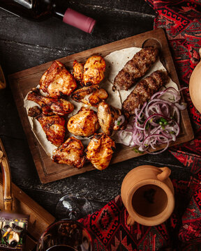fried chicken with lule kebab and sliced onion