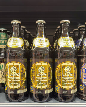 bottles of Augustiner Edelstoff beer, a Helles-style lager brewed in Munich. Udine, Italy. March 22, 2026