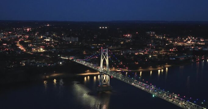 Poughkeepsie, NY, Early spring night arial video of the Franklin D. Roosevelt Mid-Hudson Bridge looking toward Poughkeepsie. 