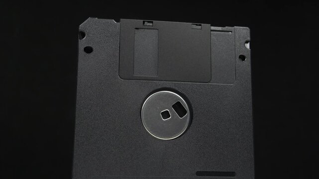 Black floppy diskettes. Floppy disk, diskette, or floppy diskette - type of disk storage made from a thin, flexible disk coated with magnetic storage medium