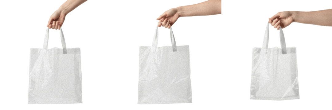 Hands holding white plastic shopping bags mockup for retail branding and grocery carrier concept, isolated on white background