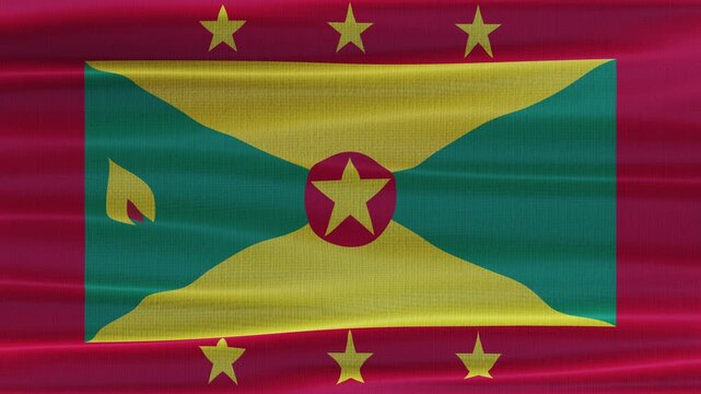 Grenada flag waving in the wind with high quality fabric texture