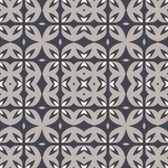 Fototapeta premium A pattern of squares with a flower in the middle. The squares are black and white