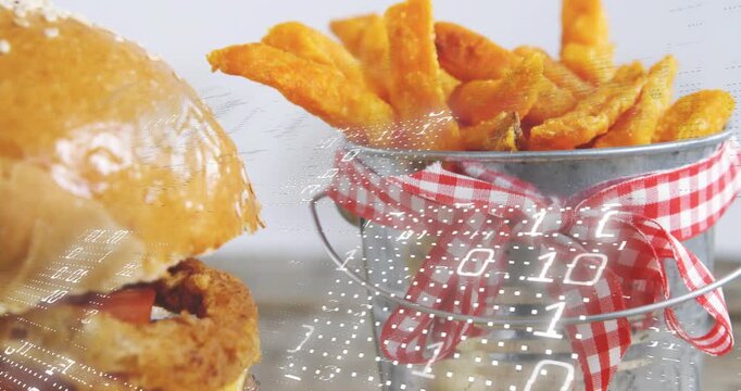 Camera pushing left, zooming and revealing burger; binary overlay drifting over fries for food ad