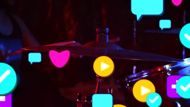 Sticks striking cymbal and snare, first hit causing icons drifting inward showing live engagement