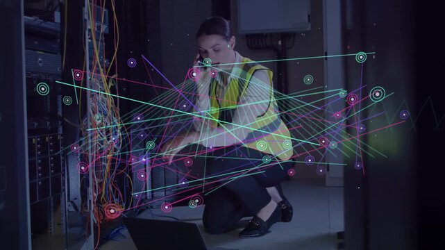 Network alert appearing, tech testing cables at rack, using laptop and phone, overlay linking gear