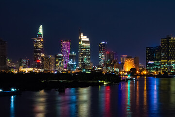 Obraz premium Night colorful cityscape of District 1 of Ho Chi Minh City
