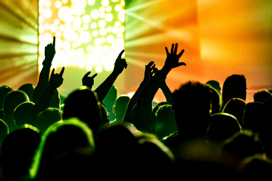 crowd of people dancing on the stage
